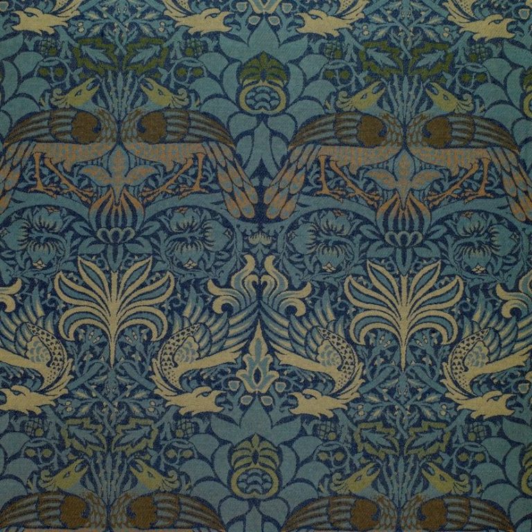 Muster mit stilisierten Ornamenten in Blau- und Goldtönen.